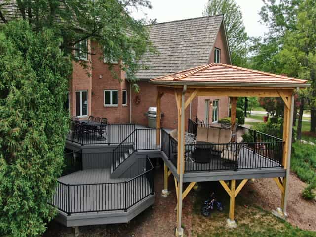 Multi-level composite deck with an open porch